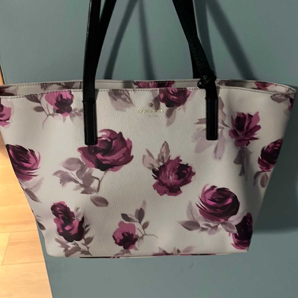 Kate Spade purse floral original style not sold anymore.